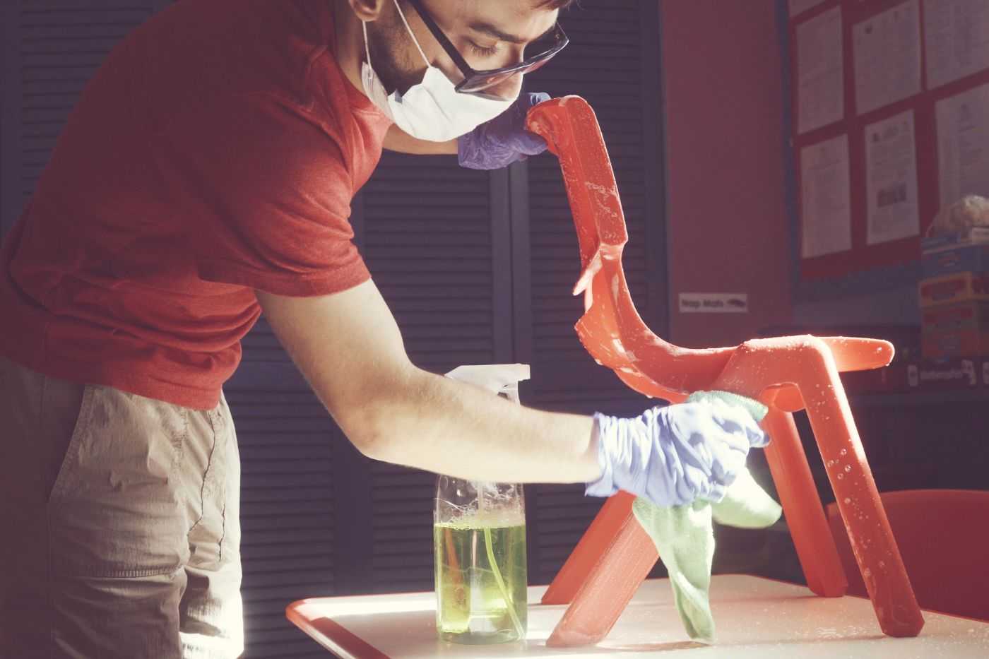 Man Cleaning Daycare Center Chair